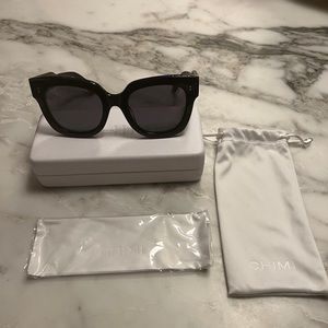 Brand new unused Chimi 08 Black sunglasses with pouch, cloth, hard shell case.
